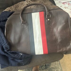 Elegant Brown Leather Duffel Bag with Stripes